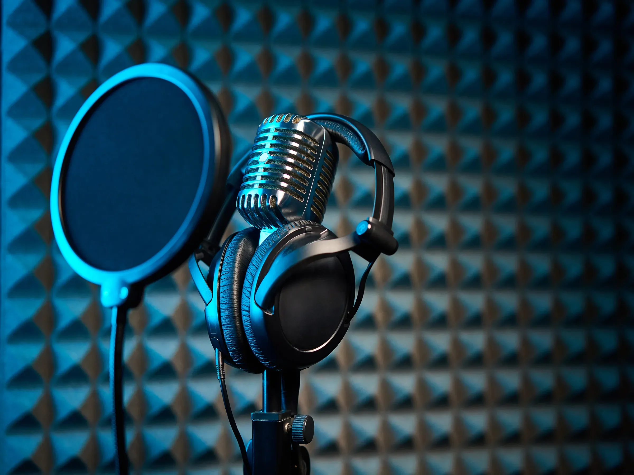 Podcast microphone on dark background